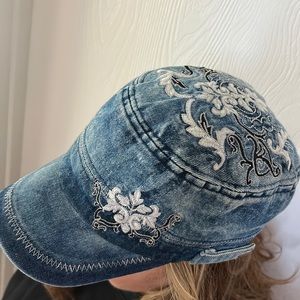 Ladies blue jean material hat with embroidered design